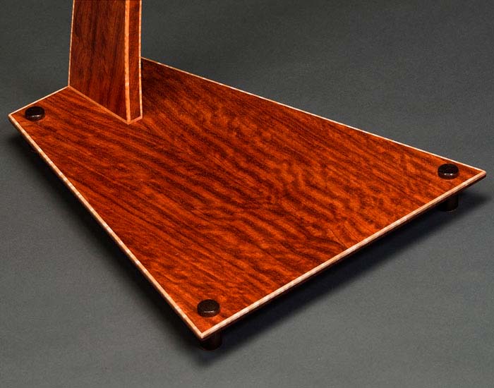 SM guitar stand base in bubinga with curly maple edge binding.