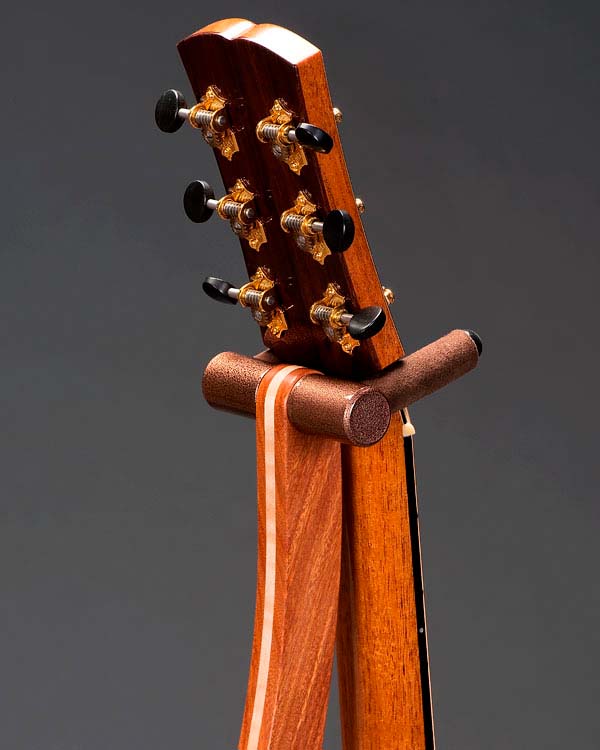 Santos mahogany with curly maple inlay. Copper powdercoating.