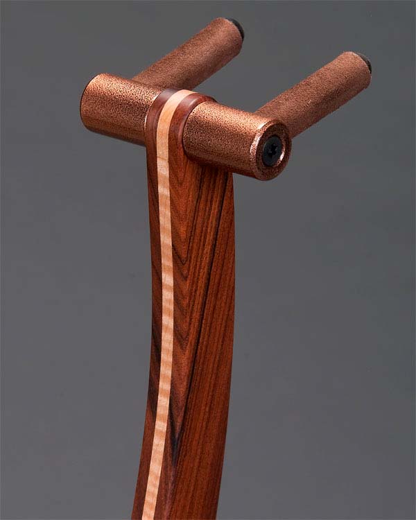 Rosewood with curly maple inlay. Copper powdercoating.