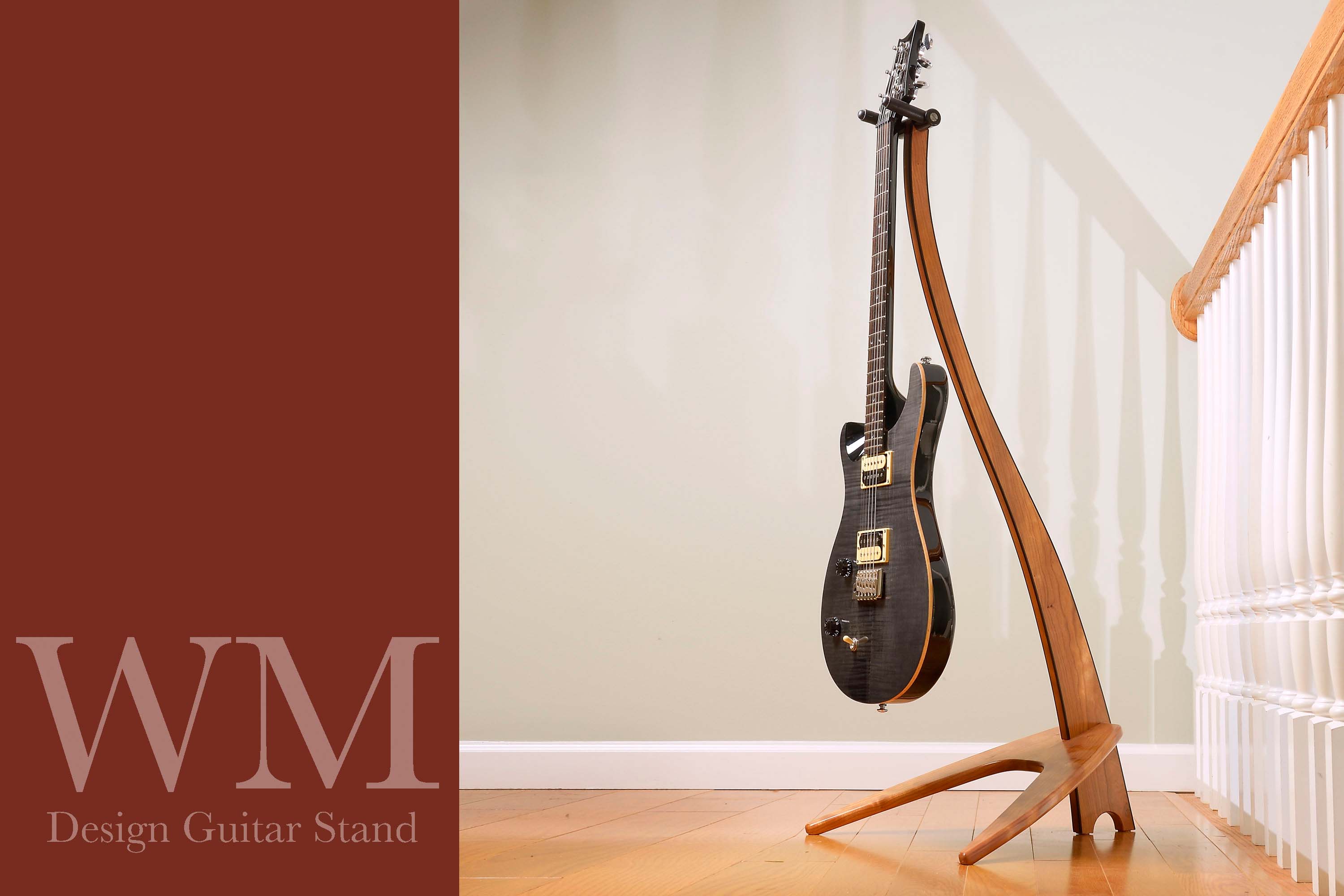 WM Guitar Stand in cherry with ebony binding.