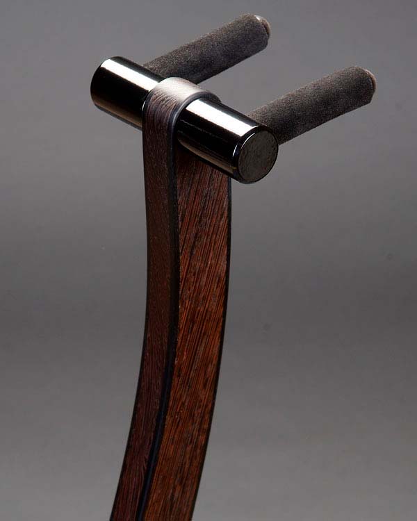 Wenge with ebony edge binding. Mirror black powdercoating.